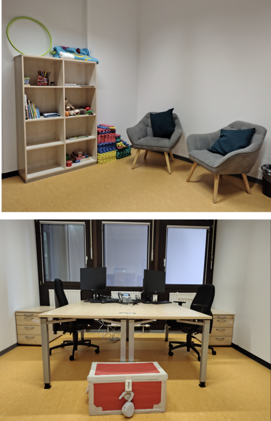 Büroraum mit 2 Arbeitsplätzen und einer Spielecke mit weiteren Sitzmöglichkeiten und Spielzeug für Kinder
